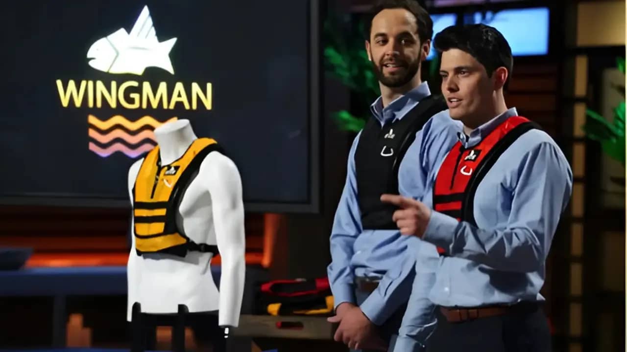 "Founders Mike Fox and Pat Hughes presenting The Wingman Life Jacket on Shark Tank wearing inflatable vests"