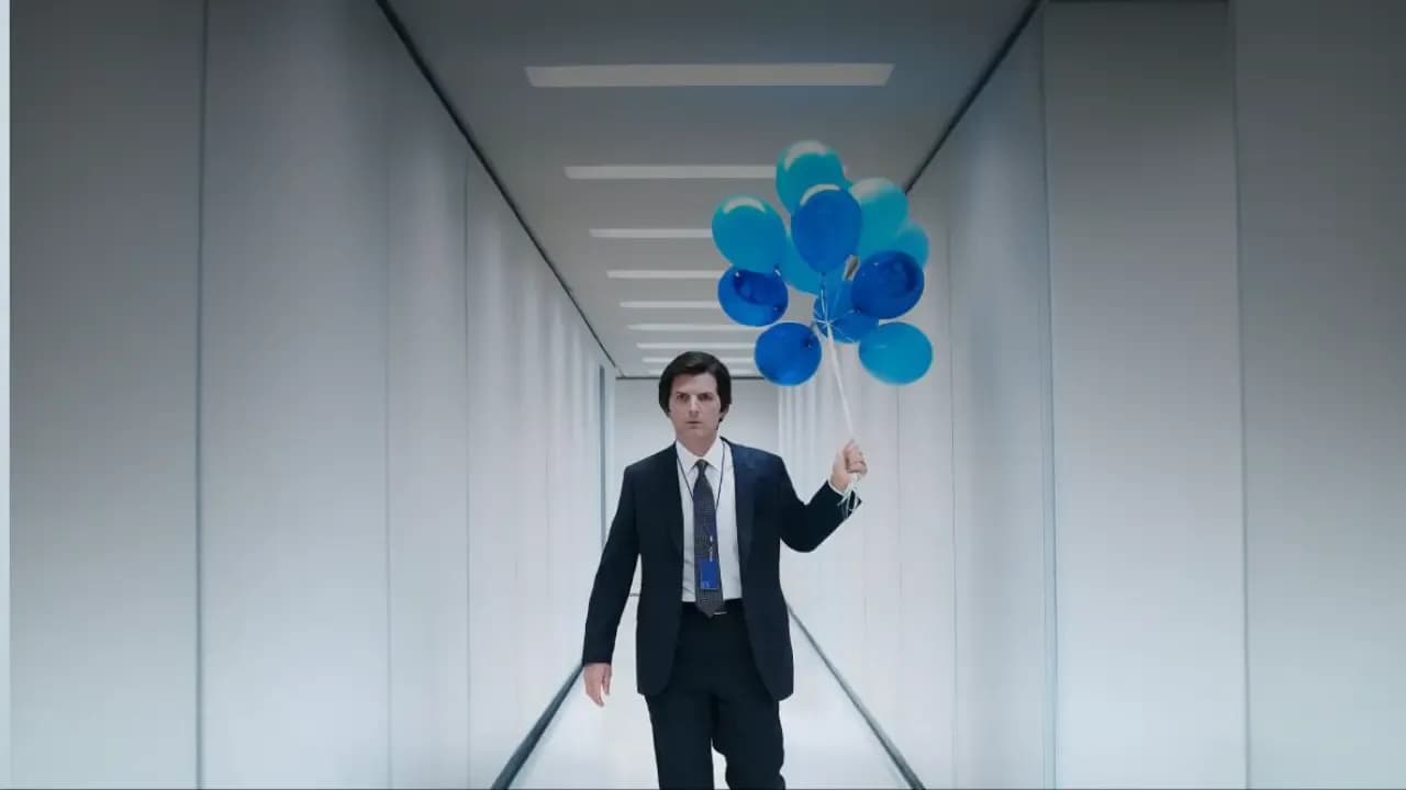 Severance Season 2 main actor with blue balloons on hand