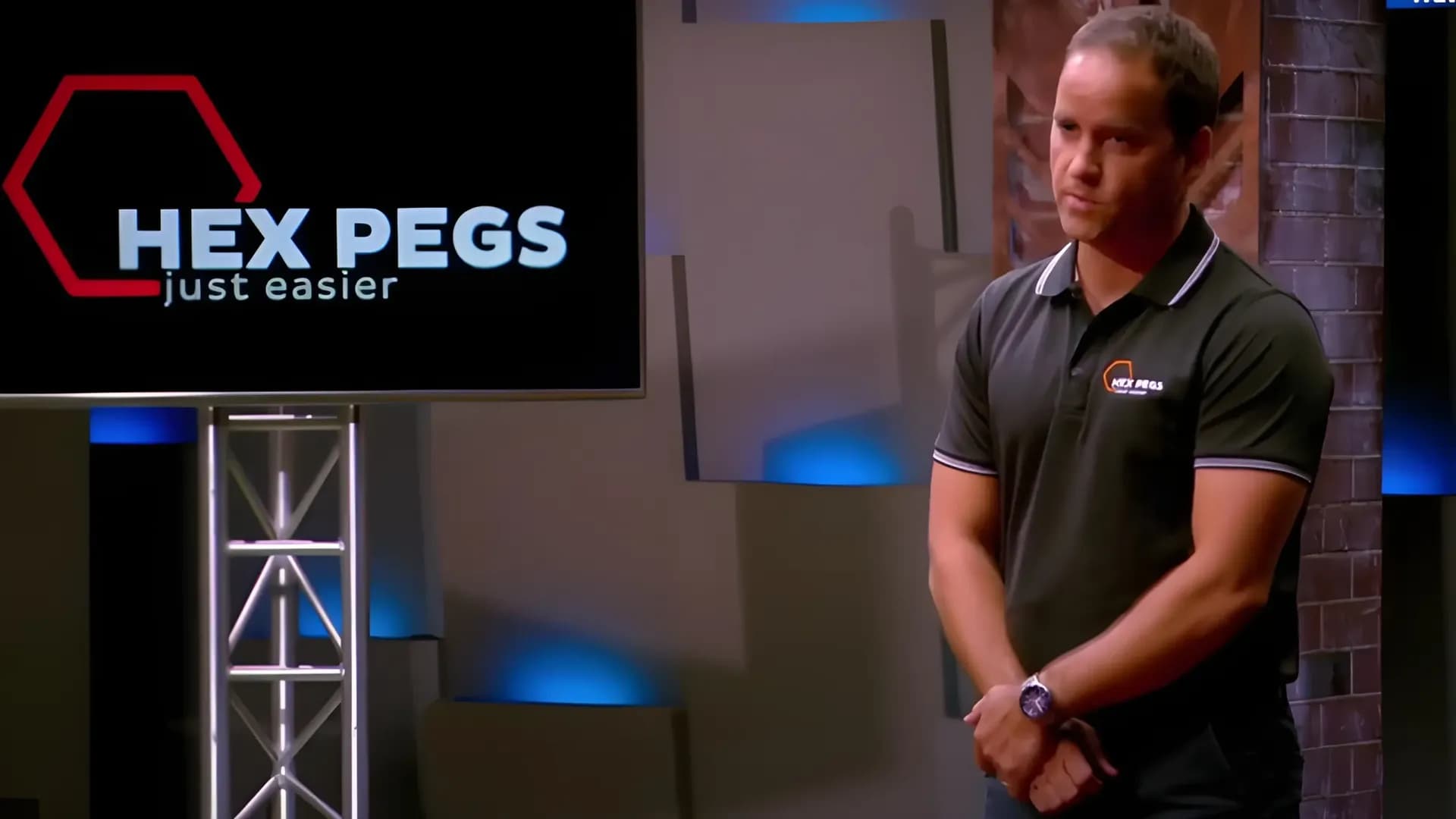 Damian Joyce presenting Hex Pegs on Shark Tank Australia, showcasing easy-to-use drill-in tent pegs for campers.