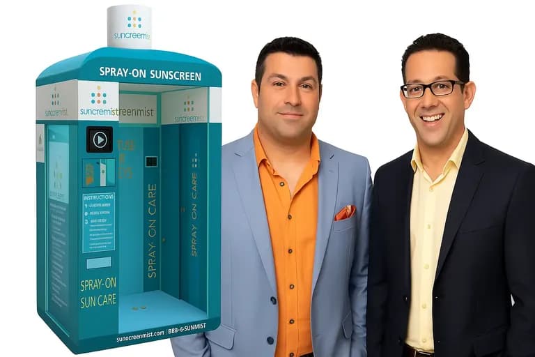 Founders of Sunscreen Mist standing beside their spray-on sunscreen booth from Shark Tank
