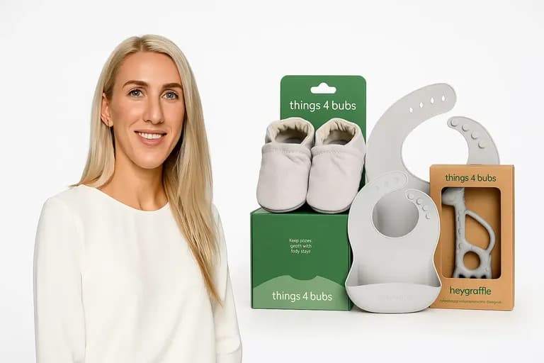 Caroline Africh, founder of Things 4 Bubs, pictured with baby bibs, teether, and shoes from the product line