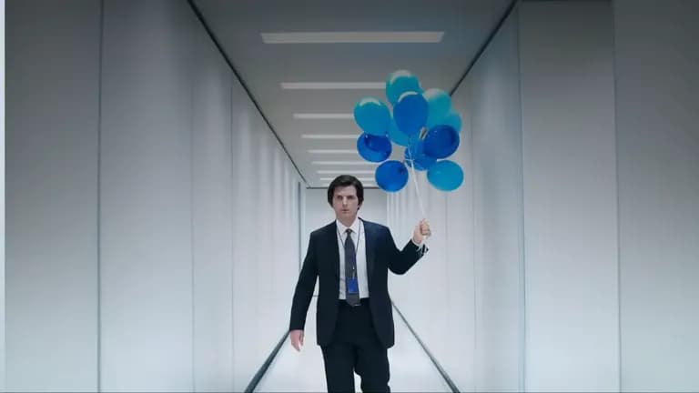 Severance Season 2 main actor with blue balloons on hand