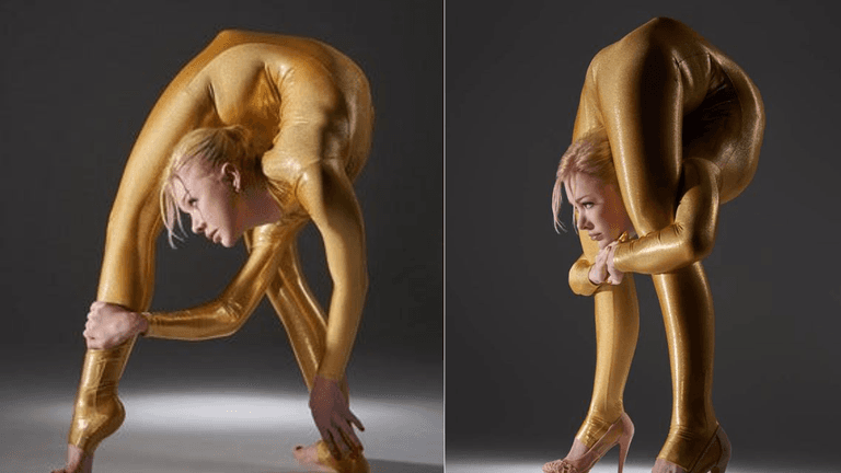 Julia Günthel, known as the Human Slinky, performing an extreme contortion pose in a gold bodysuit