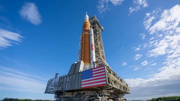 NASA’s Crawler-Transporter moving the SLS rocket and Orion spacecraft from the Vehicle Assembly Building to Launch Pad 39B for Artemis II.