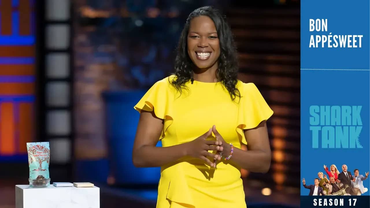 Thereasa Black in a yellow dress presenting Bon AppéSweet chocolate on Shark Tank Season 17.