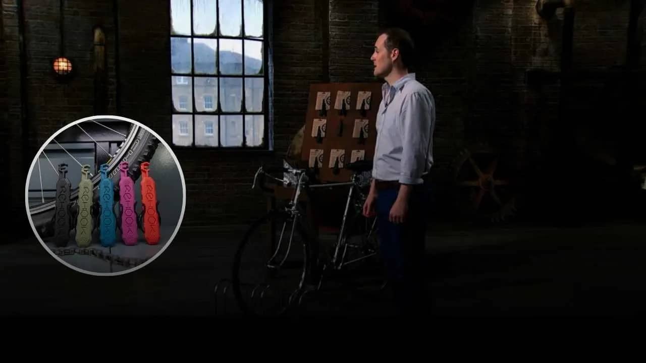 Rehook founder presents bike chain tool on Dragons’ Den with display board and demo bicycle