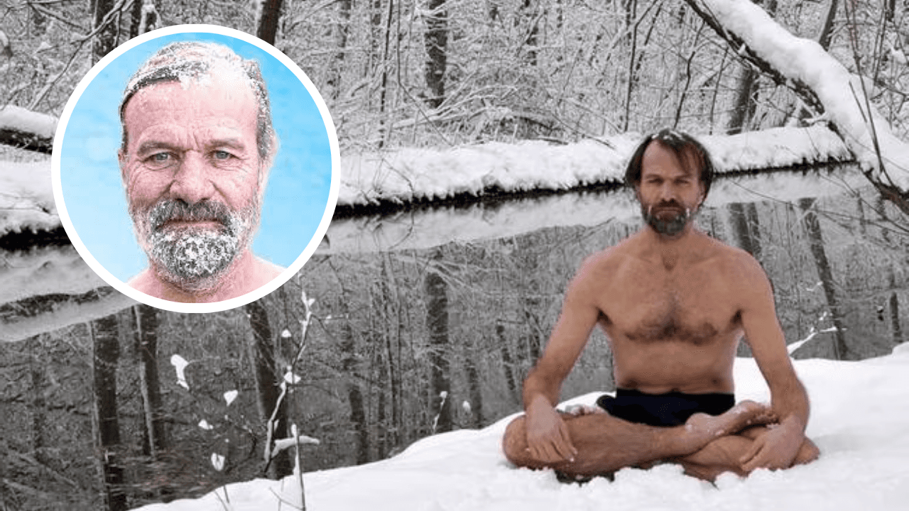 Wim Hof, known as The Iceman, sits shirtless in a snowy forest practicing deep breathing meditation beside an icy river.