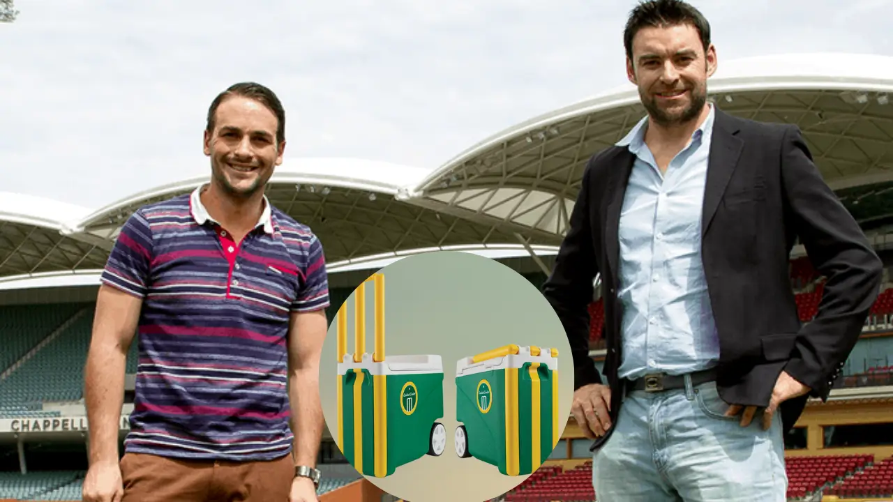 Cricket Cooler founders Adam Dubrich and Leigh Warren standing at a stadium with their patented cooler-stump product in the foreground.