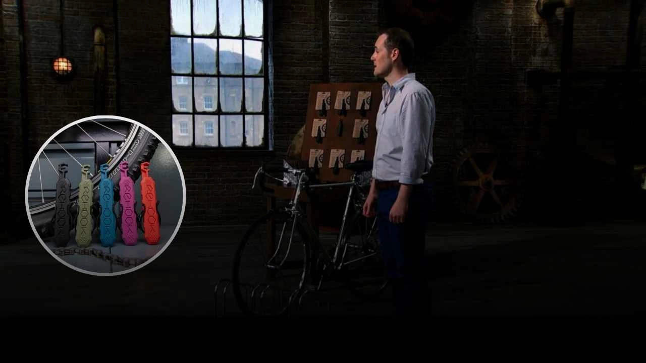 Rehook founder presents bike chain tool on Dragons’ Den with display board and demo bicycle