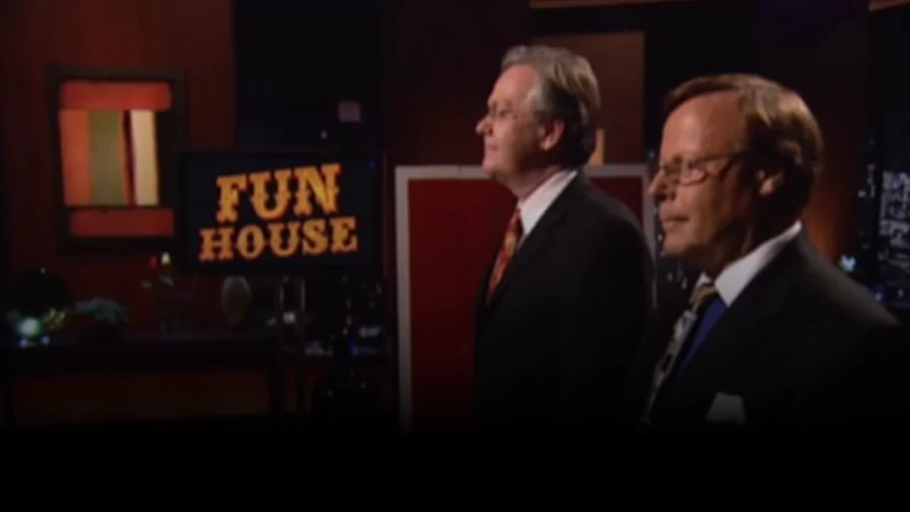 Side view of The Funhouse Project founders with Fun House sign during Shark Tank pitch