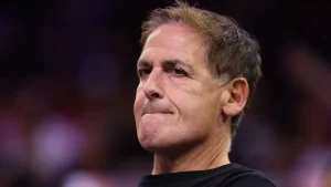Mark Cuban looking serious during a public appearance, emphasizing financial planning for entrepreneurs.