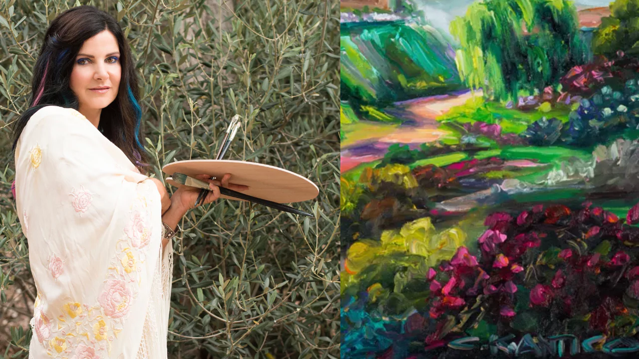Concetta Antico, a tetrachromat artist, holding a palette and brushes beside her vibrant landscape painting showing 100 million colors she can see